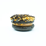 Tim tam Macaron with chocolate drizzles on top and sprinkled nuts