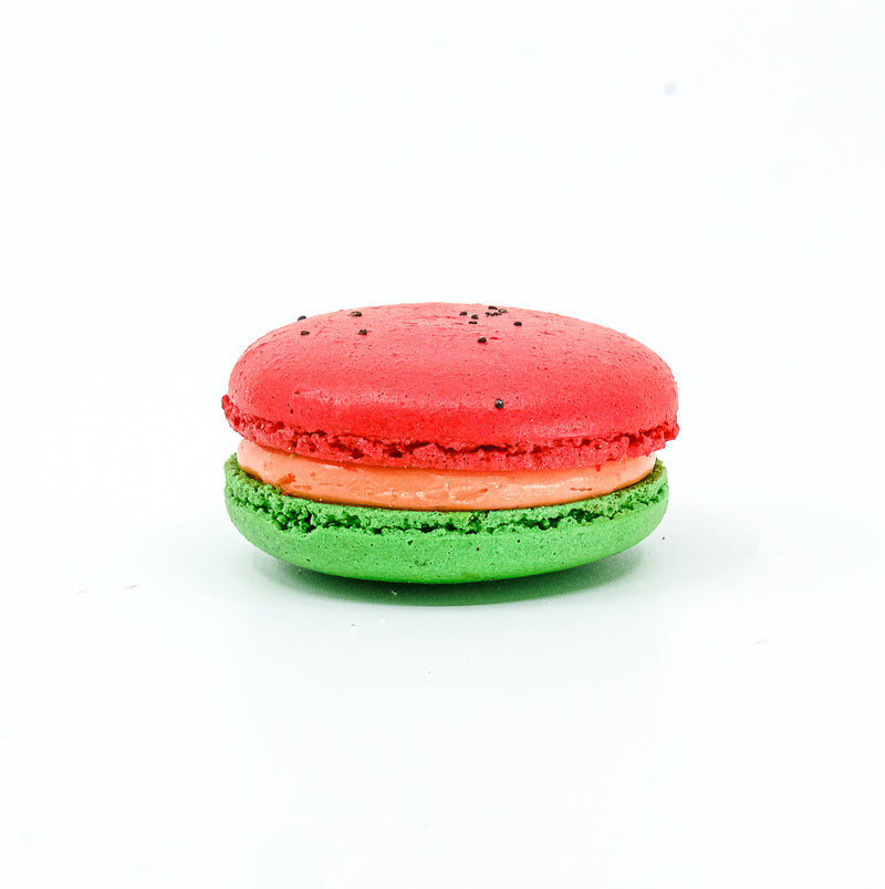 Watermelon flavoured macaron. round red and green macaron