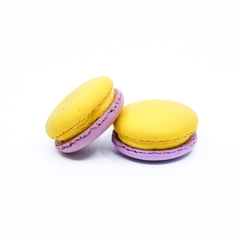 Purple and yellow round macaron. Passionfruit flavour